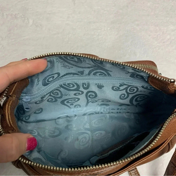 Brighton tan purse with blue patterned interior.  Built in wallet - Picture 8 of 10
